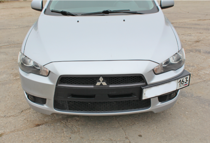 Рамка под номер на передний бампер для Mitsubishi Lancer X (2007-2016) купить недорого с доставкой в Ленинск-Кузнецкий