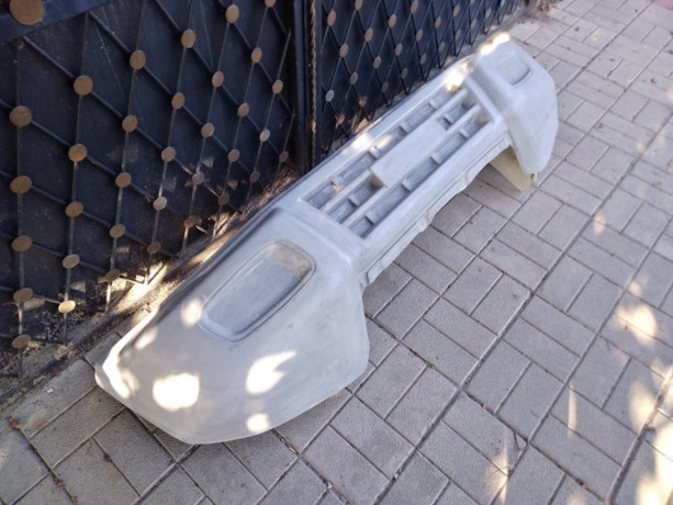 Силовой передний бампер стеклопластиковый на Mitsubishi Pajero III купить недорого с доставкой в Ленинск-Кузнецкий